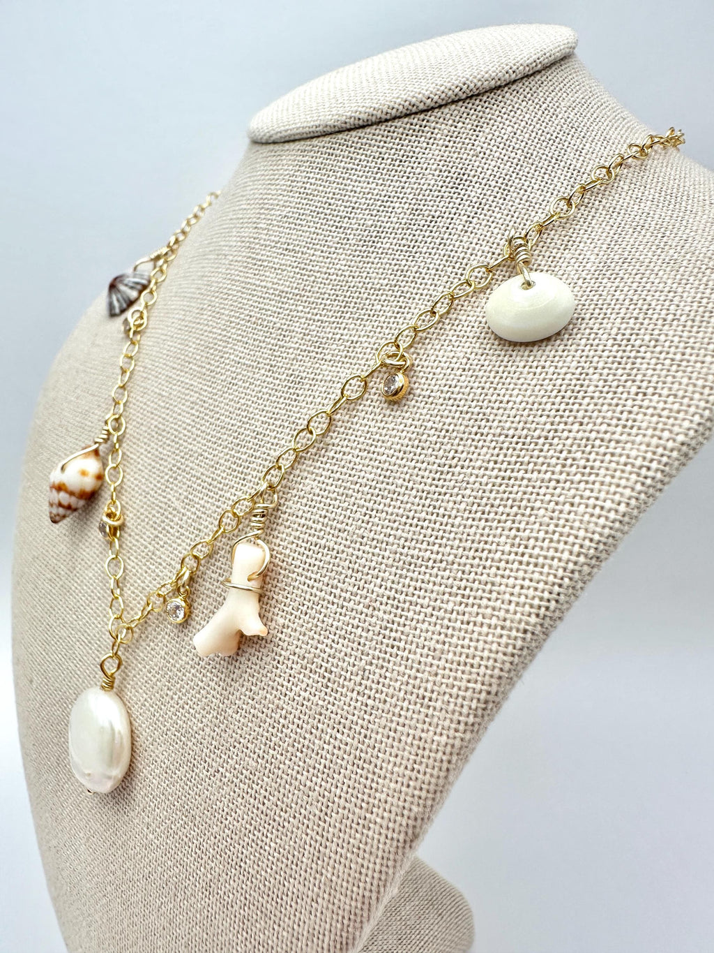 Freshwater Pearl Coin, Handpicked Shells, Coral and Sparkling Cubic Zirconia Charm Necklace on 14K Gold Filled Chain