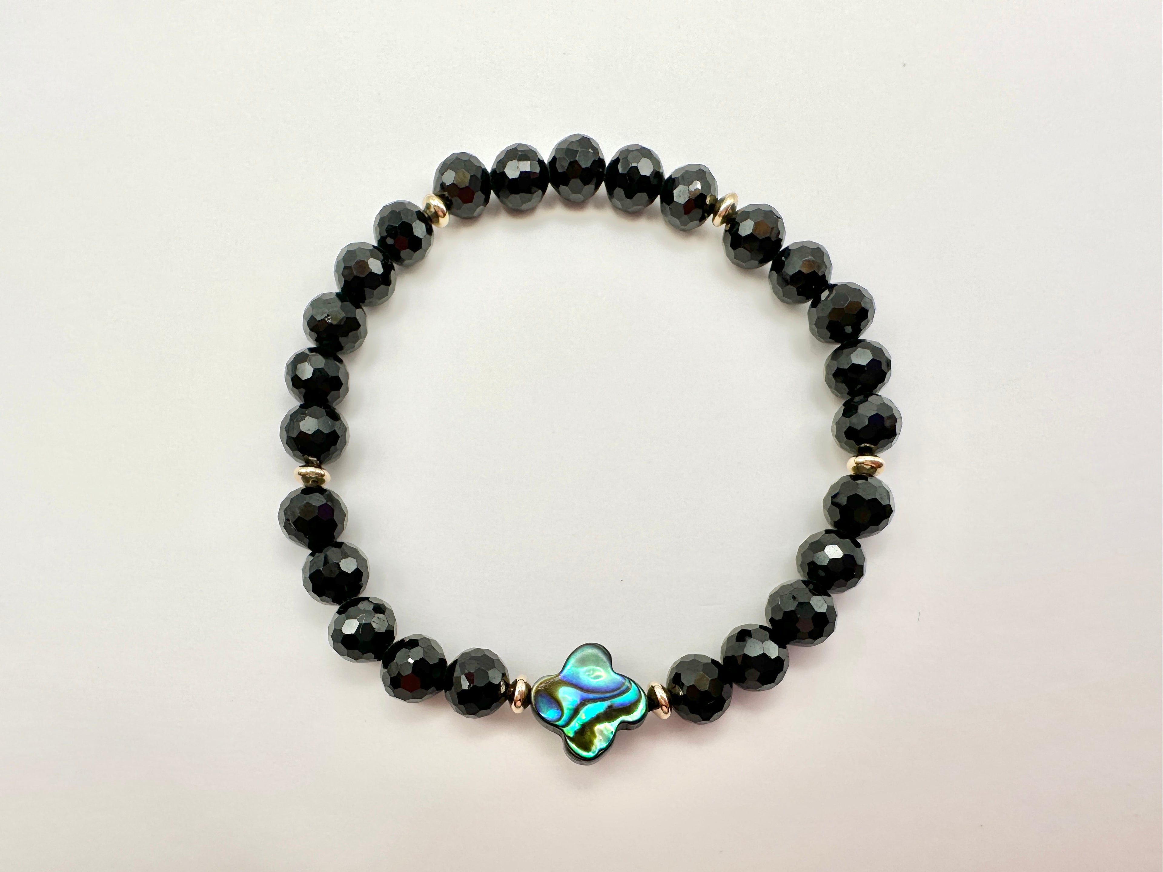 Black Spinel Stretch Bracelet with an Iridescent Abalone Clover and 14K Gold Filled Accents